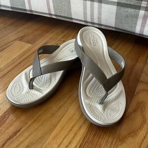 Crocs women’s flip flops, size 10